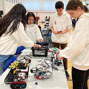 Lab Robotics Teams Compete Here and Abroad